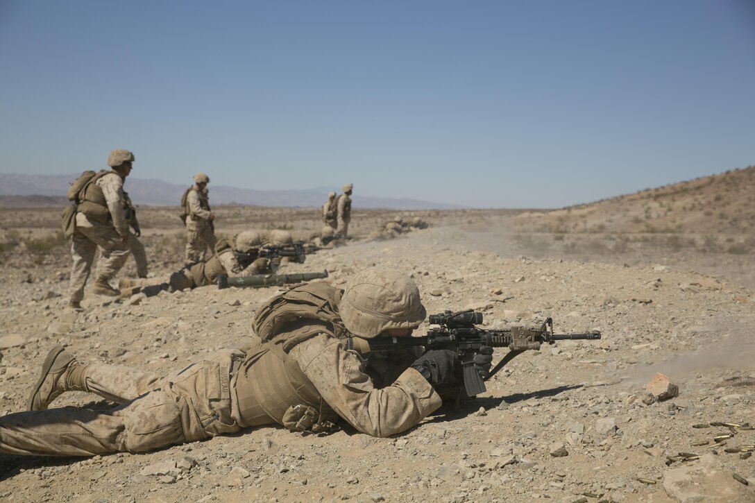 Marines with 3rd Battalion, 4th Marines, 7th Regiment, conduct live-fire training at Range 410 aboard the Marine Corps Air Ground Combat Center, Twentynine Palms Calif., May 19, 2016. Members of the Business Executive for National Security took the opportunity to observe the training during a tour of the installation. (Official Marine Corps photo by Cpl. Thomas Mudd/Released)