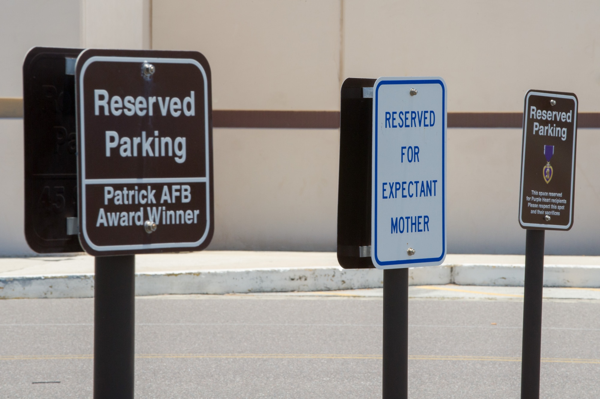 Changes to reserved parking across the installation have materialized over the past three months. In that time, the 45th Civil Engineer Squadron has removed, installed or modified more than 750 reserved parking signs at Patrick Air Force Base and Cape Canaveral Air Force Station, Fla. The changes reflect Brig. Gen. Wayne Monteith, 45th Space Wing commander's vision of what reserved parking should look like on the base. (U.S. Air Force photo/Benjamin Thacker/Released) 