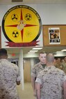 NAVAL SUPPORT FACILITY INDIAN HEAD, MD -- Warrant Officer Daniel Pare, an explosive ordnance disposal officer, with Chemical Biological Incident Response Force (CBIRF), receives the Bronze Star Medal with Combat Distinguishing Device for heroic service in connection with combat operations against the enemy in support of Operation Enduring Freedom while serving as an explosive ordnance disposal team lead, 2nd Marine Logistics Group (Forward), II Marine Expeditionary Force (Forward), in Watan Kalay, Gereshk Valley, Afghan., from Apr. 9, 2011 to Oct. 24, 2011.

Pare, a native of Bristol, Mass., disposed of more than 47,000 pounds of explosive material including 30 improvised explosive devices and 11 enemy weapons caches during this time period.

On July 15, 2011, he rendered aid to a seriously wounded soldier while under heavy enemy fire, and after leaving his covered position, he maneuvered to the wounded soldier and administered critical medical aid until the wounded soldier was evacuated.

While further assisting in the defense of his unit’s position, Pare located a spotter for enemy mortars and directly engaged him with a M2CG recoilless rifle system, ultimately succeeding in neutralizing the enemy observer and decimating the enemy’s will to persist. (Official USMC Photos by Sgt. Santiago G. Colon Jr./Released) 

