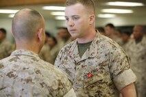 NAVAL SUPPORT FACILITY INDIAN HEAD, MD -- Warrant Officer Daniel Pare, an explosive ordnance disposal officer, with Chemical Biological Incident Response Force (CBIRF), receives the Bronze Star Medal with Combat Distinguishing Device for heroic service in connection with combat operations against the enemy in support of Operation Enduring Freedom while serving as an explosive ordnance disposal team lead, 2nd Marine Logistics Group (Forward), II Marine Expeditionary Force (Forward), in Watan Kalay, Gereshk Valley, Afghan., from Apr. 9, 2011 to Oct. 24, 2011.

Pare, a native of Bristol, Mass., disposed of more than 47,000 pounds of explosive material including 30 improvised explosive devices and 11 enemy weapons caches during this time period.

On July 15, 2011, he rendered aid to a seriously wounded soldier while under heavy enemy fire, and after leaving his covered position, he maneuvered to the wounded soldier and administered critical medical aid until the wounded soldier was evacuated.

While further assisting in the defense of his unit’s position, Pare located a spotter for enemy mortars and directly engaged him with a M2CG recoilless rifle system, ultimately succeeding in neutralizing the enemy observer and decimating the enemy’s will to persist. (Official USMC Photos by Sgt. Santiago G. Colon Jr./Released) 
