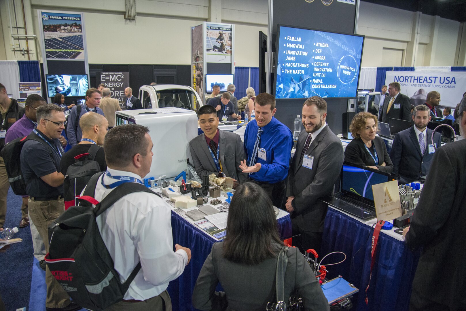 Members of the Additive Manufacturing Working Group represent NSWCCD at the Navy Energy & Innovation booth at Sea-Air-Space 2016 in National Harbor, Maryland, May 17, 2016. (U.S. Navy photo by Dustin Q. Diaz/Released)