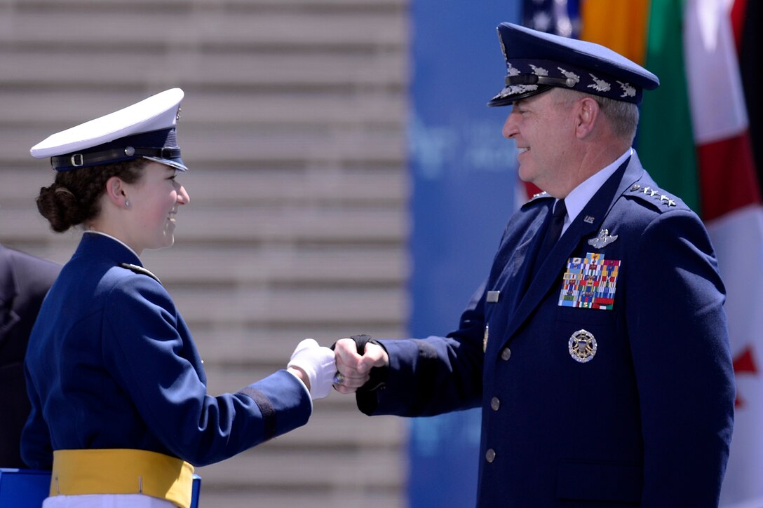 Air Force Gen. Mark Welsh, U.S. Air Force Chief of Staff, congratulates Air Force Cadet 1st Class Amy Silverbush at the U.S. Air Force Academy Class of 2016 at Falcon Stadium graduation in Colorado Springs, Colorado, June 2, 2016. The 821 cadets graduated to become the newest second lieutentants in the Air Force. Air Force photo by Mike Kaplan
