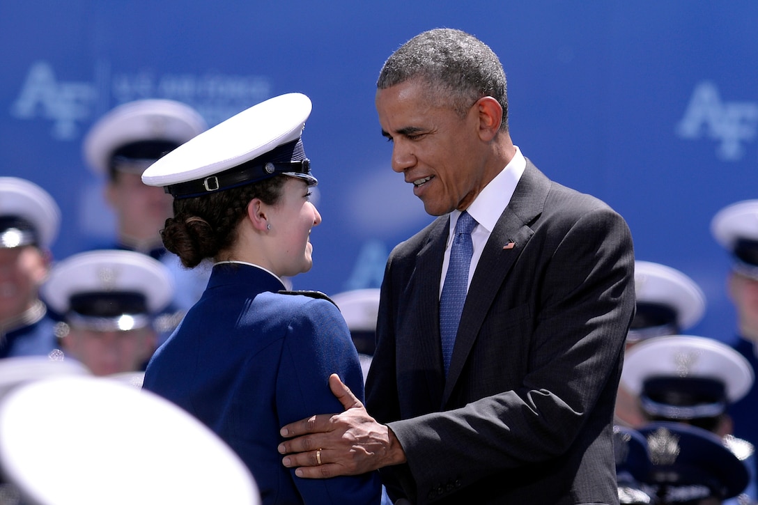 President Barack Obama congratulates Air Force Cadet 1st Class Amy Silverbush during the commencement ceremony for the Class of 2016 at the U.S. Air Force Academy in Colorado Springs, Colo., June 2, 2016. Air Force photo by Mike Kaplan