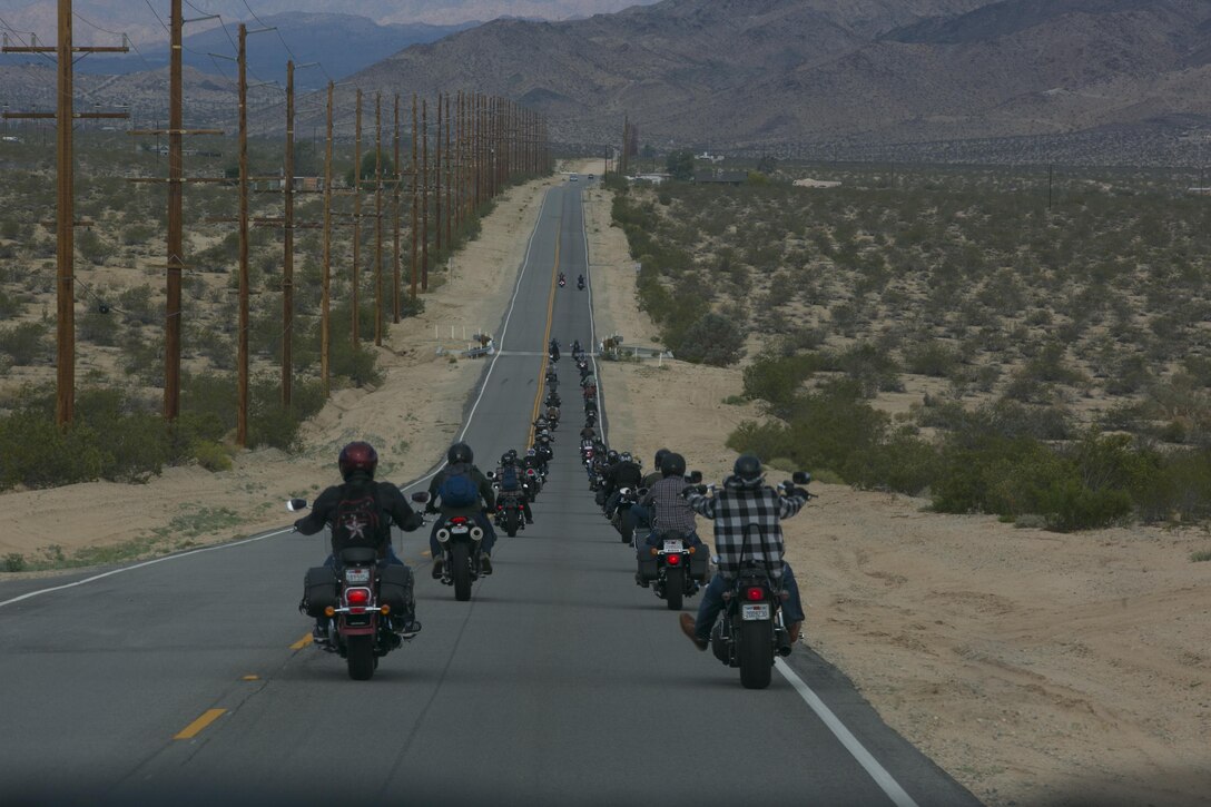 Marines, sailors, veterans and community members make their way to 29 Palms Highway during the Substance Abuse Program’s Freedom to Ride, Ride for Freedom Sober Motorcycle Ride May 20, 2016. More than 40 motorcycle riders attended the event to raise awareness of the dangers of substance abuse.  (Official Marine Corps photo by Lance Cpl. Dave Flores/Released)