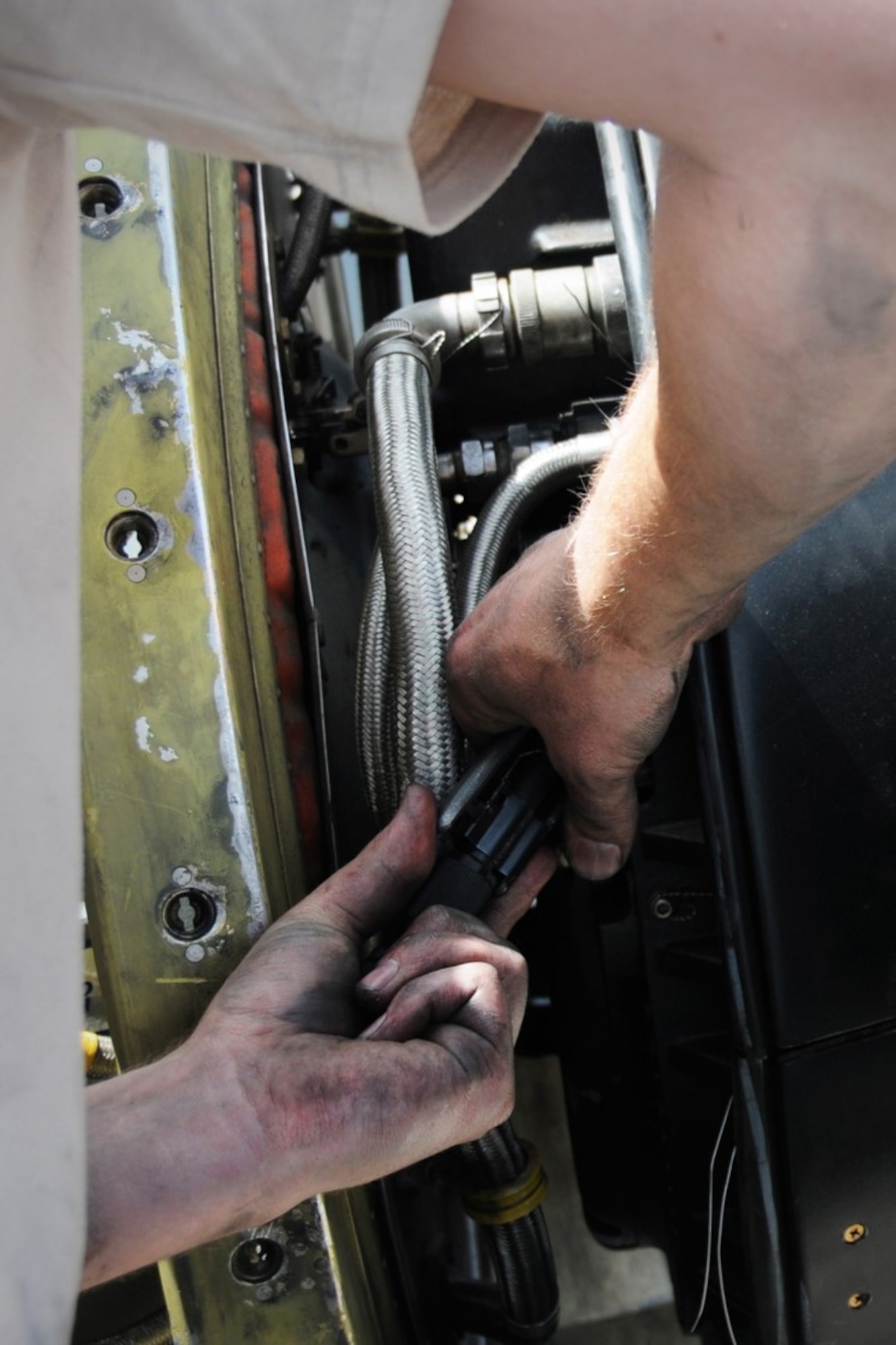 Senior Airman Jeremy Putman, 94th Aircraft Maintenance Squadron aerospace propulsion technician, performs maintenance on a C-130 in Amman, Jordan, May 15, 2016, in support of Exercise Eager Lion. This year Eager Lion was a bilateral exercise including U.S. and Jordanian military forces, held May 15-24. (U.S. Air Force photo/Staff Sgt. Alan Abernethy)

