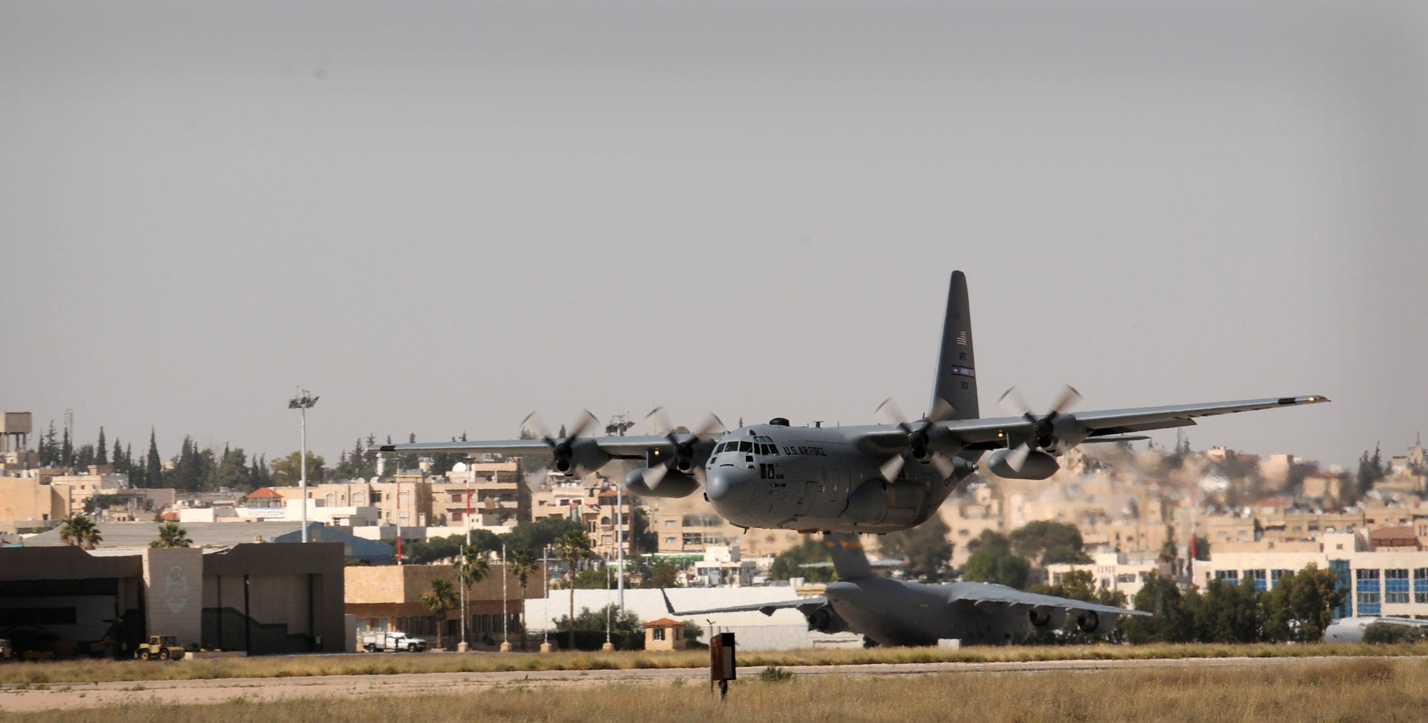 A 94th Airlift Wing C-130 takes off  from King Abdullah Air Base, Jordan, in support of Eager Lion 2016, May 22, 2016. This year Eager Lion was a bilateral partnership including the U.S. and Jordanian military forces held May 15-24.  (U.S. Air Force photo/Staff Sgt. Alan Abernethy)
