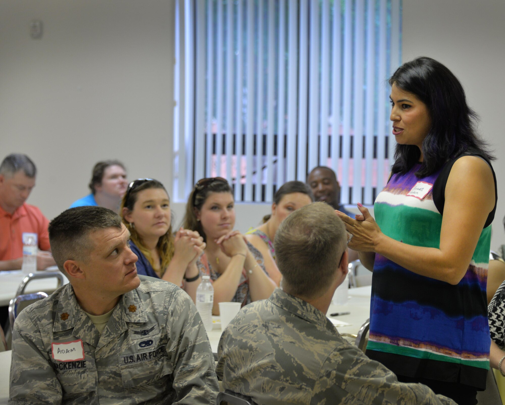 Bernadette Henderson, wife of Col. Paul Henderson, 782nd Training Group commander, speaks to the spouses about the importance of their role at the Key Spouse Dinner at Sheppard Air Force Base, Texas, May 24, 2016. Mrs. Henderson offered advice and words of encouragement to Key Spouses by stating, "You are very special. You are chosen. For that, you need to lead by example and strive to reach out to every spouse." (U.S. Air Force photo/2nd Lt. Brittany Curry)