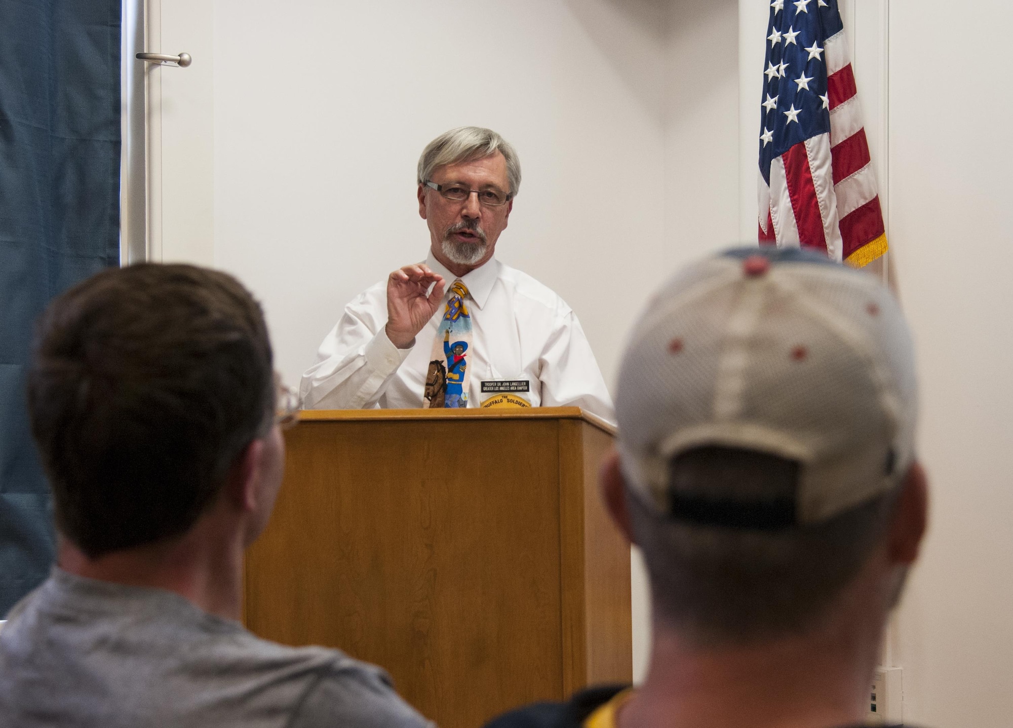 John Langellier, Ph.D., consulting historian, speaks about the history of the Buffalo Soldiers to a group of people in the Warren ICBM & Heritage Museum on F.E. Warren Air Force Base, Wyo., June 1, 2016. The presentation delved into lesser-known aspects of the soldier's history. (U.S. Air Force photo by Senior Airman Jason Wiese)