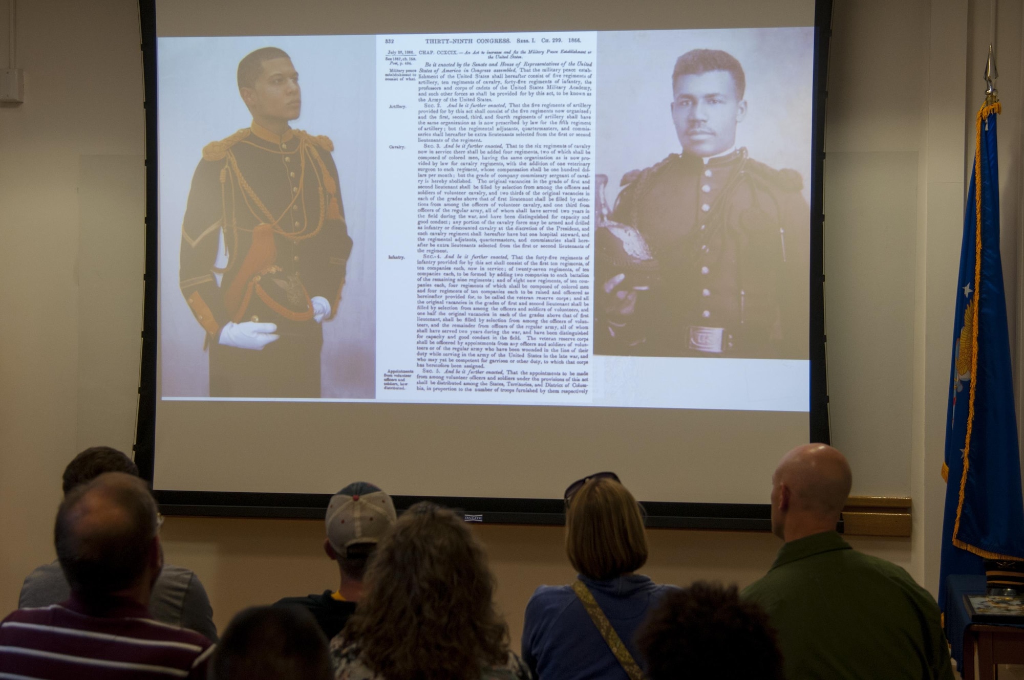 Warren ICBM & Heritage Museum guests look at a presentation about Buffalo Soldiers delivered by John Langellier, Ph.D., consulting historian, June 1, 2016, in the Warren ICBM & Heritage Museum on F.E. Warren Air Force Base, Wyo. The presentation is a way to honor the Buffalo Soldiers’ legacy and recognize the base’s heritage. (U.S. Air Force photo by Senior Airman Jason Wiese)