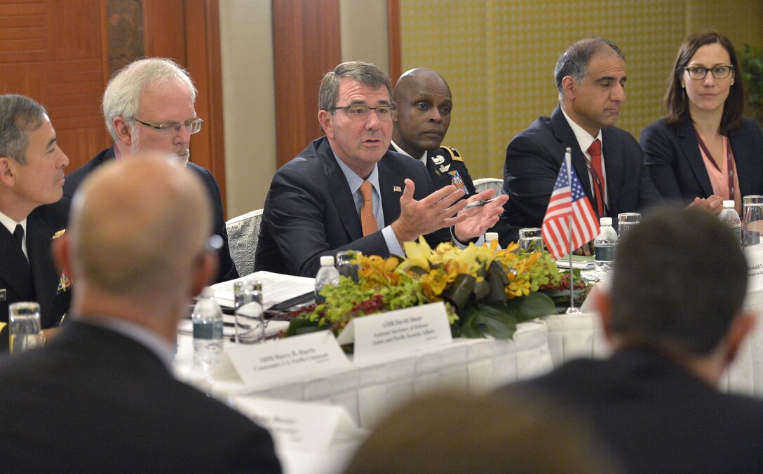 Defense Secretary Ash Carter hosts a meeting with Australian Defense Minister Kevin Andrews and Japanese Defense Minister Gen Nakatani at the Shangri-La Dialogue in Singapore, May 30, 2015. At the 2016 dialogue, the defense secretary will deliver a keynote address and meet with Singapore officials. DoD photo by Glenn Fawcett