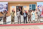 ULAANBAATAR, Mongolia (June 02, 2016) – Multinational military leaders and Mongolian civilian officials cut the ceremonial ribbon, officially opening the 4th School Dormitory at the ribbon-cutting ceremony commemorating the completion of the project that was built as part of an Engineering Civic Action Program during Khaan Quest 2016, in the city of Zuunmod, Mongolia. The dormitory was built by Mongolian soldiers and construction workers; U.S. Marines from the 9th Engineer Support Battalion; U.S. Soldiers from the 411th Engineer Battalion; U.S. Sailors attached to Naval Mobile Construction Battalion (NMCB) 4; service members from the Singapore Armed Forces; and service members from the Indian Armed Forces. Khaan Quest 2016 is an annual, multinational peacekeeping operations exercise hosted by the Mongolian Armed Forces, co-sponsored by U.S. Pacific Command, and supported by U.S. Army Pacific and U.S. Marine Corps Forces, Pacific. Khaan Quest, in its 14th iteration, is the capstone exercise for this year’s Global Peace Operations Initiative program. The exercise focuses on training activities to enhance international interoperability, develop peacekeeping capabilities, build to mil-to-mil relationships, and enhance military readiness. 