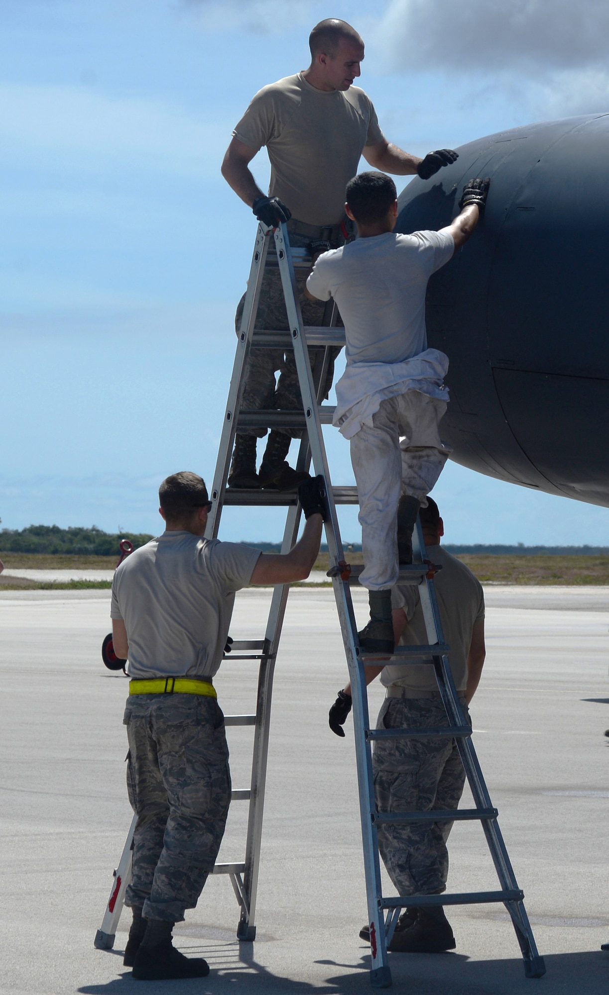 Members from the 36th Expeditionary Aircraft Maintenance Squadron conduct a post-flight inspection on a B-52 Stratofortress after its arrival June 2, 2016, at Andersen Air Force Base, Guam.  The aircraft is deployed in support of U.S. Pacific Command’s Continuous Bomber Presence operations. The U.S. military has maintained a deployed strategic bomber presence in the Pacific since March 2004, which has contributed significantly to regional security and stability. (U.S. Air Force photo by Airman 1st Class Alexa Ann Henderson/Released)