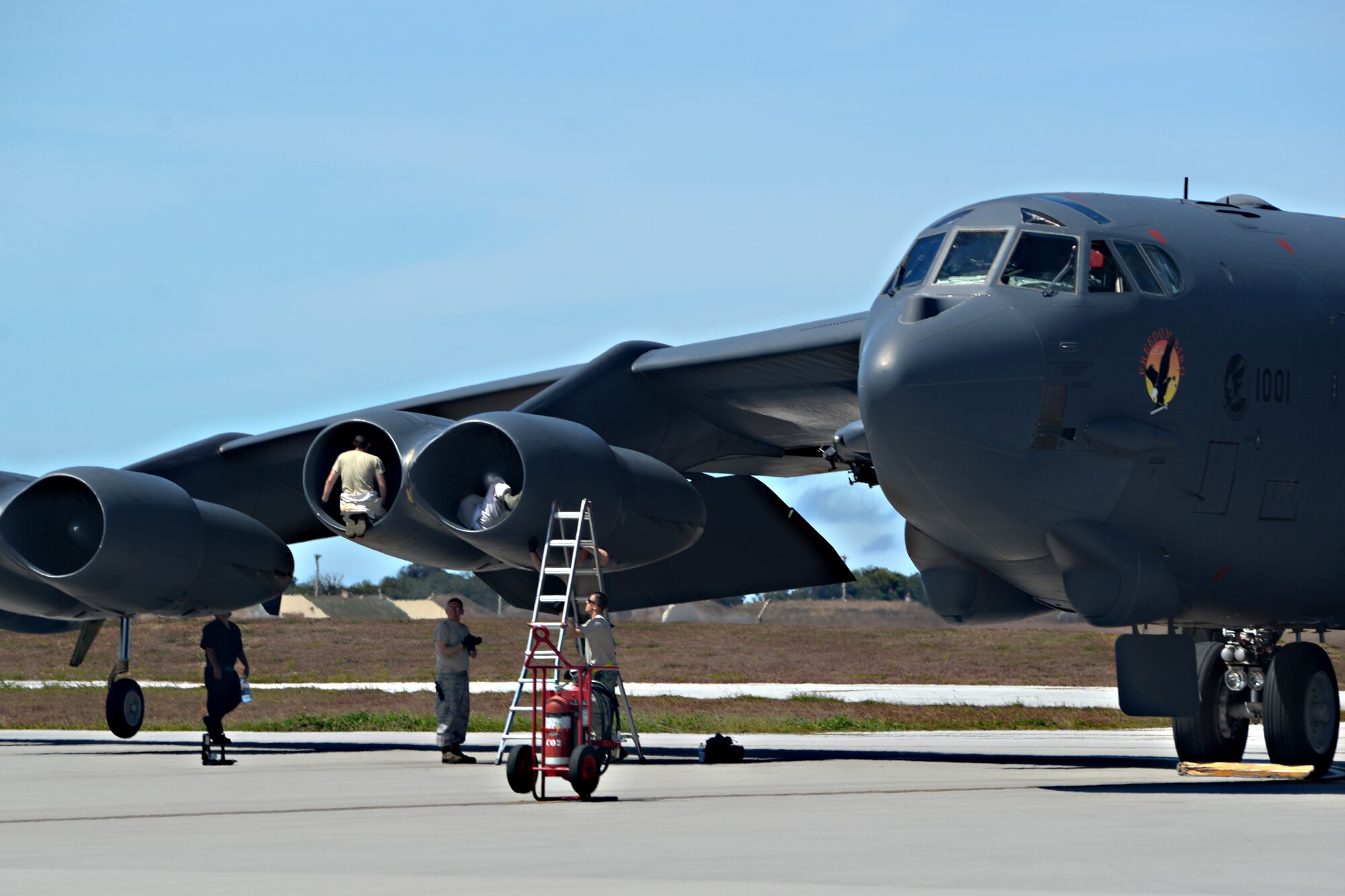 Members of the 36th Expeditionary Aircraft Maintenance Squadron conduct a post-flight inspection on a B-52 Stratofortress after its arrival June 2, 2016, at Andersen Air Force Base, Guam. The aircraft is deployed in support of U.S. Pacific Command’s Continuous Bomber Presence operations. These aircraft and the men and women who fly and support them provide a significant capability that enables U.S. readiness and commitment to deterrence, provides assurances to allies, and strengthens regional security and stability in the Indo-Asia-Pacific region. (U.S. Air Force photo by Airman 1st Class Alexa Ann Henderson/Released)   