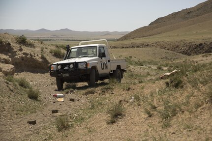 A United Nations truck stages during the culminating event of the counter-improvised explosive device training portion of Khaan Quest 2016 at Five Hills Training Area near Ulaanbaatar, Mongolia, June 1. The training provided MAF members with the skills to safely identify and mark potential threats in a minefield, extract personnel and vehicles from minefields and develop IED awareness. Khaan Quest 2016 is an annual, multinational peacekeeping operations exercise hosted by the Mongolian Armed Forces, co-sponsored by U.S. Pacific Command, and supported by U.S. Army Pacific and U.S. Marine Corps Forces, Pacific. Khaan Quest, in its 14th iteration, is the capstone exercise for this year’s Global Peace Operations Initiative program. The exercise focuses on training activities to enhance international interoperability, develop peacekeeping capabilities, build to mil-to-mil relationships, and enhance military readiness. (U.S. Marine Corps Photo by Cpl. Janessa K. Pon)