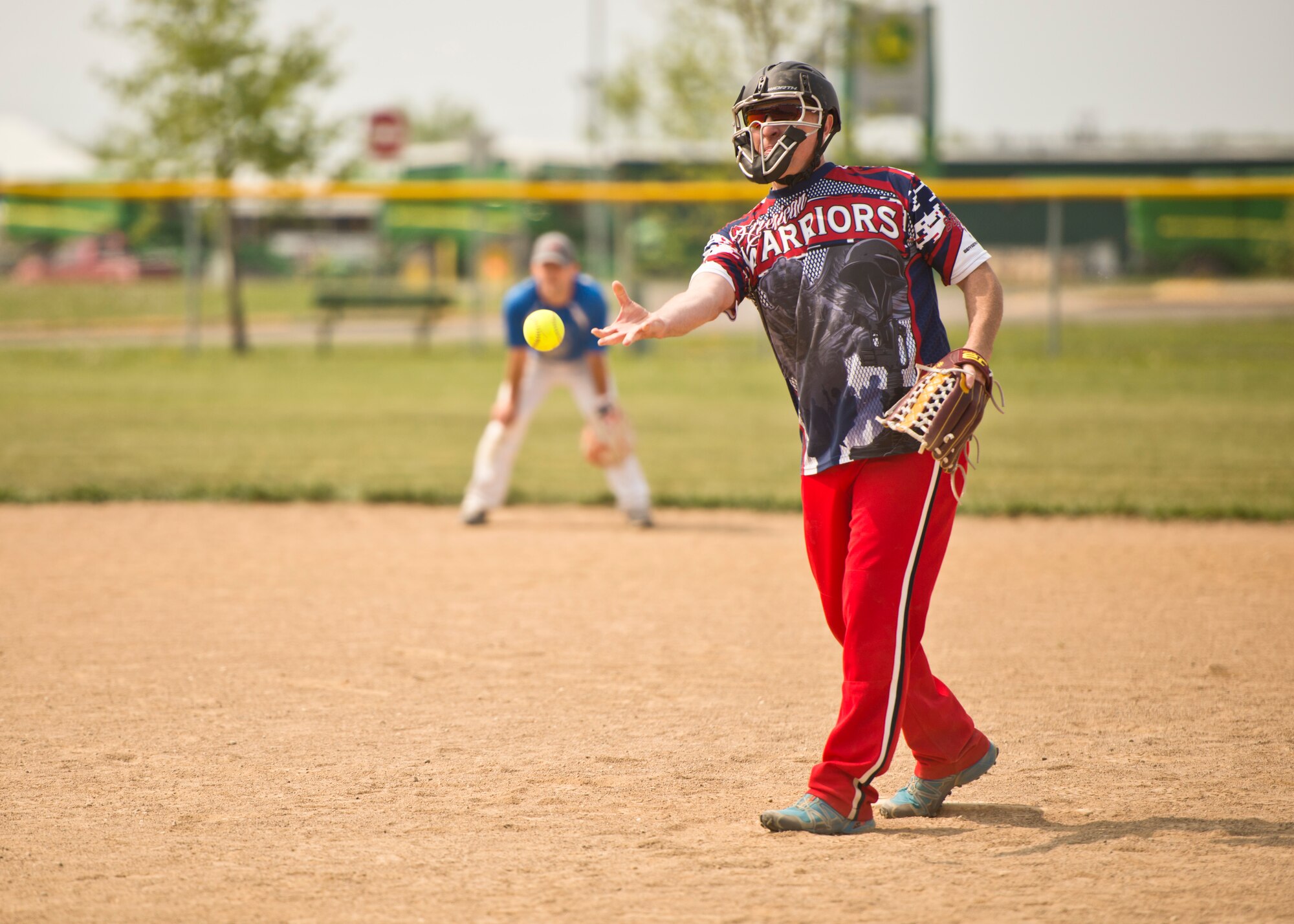 Team Minot faced-off against Team Grand Forks in the 2nd annual Wingman Week softball tournament in Devil’s Lake, N.D., May 20, 2016. Wingman week is intended to help Airmen recharge and to reframe the Wingman concept. Grand Forks won the final game, becoming this year’s softball tournament champions. (U.S. Air Force photo/Airman 1st Class J.T. Armstrong) 