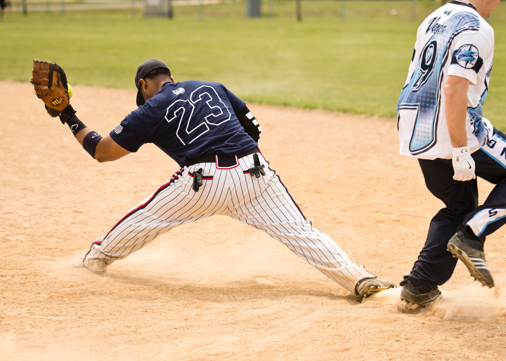 Team Minot faced-off against Team Grand Forks in the 2nd annual Wingman Week softball tournament in Devil’s Lake, N.D., May 20, 2016. Wingman week is intended to help Airmen recharge and to reframe the Wingman concept. Grand Forks won the final game, becoming this year’s softball tournament champions. (U.S. Air Force photo/Airman 1st Class J.T. Armstrong) 