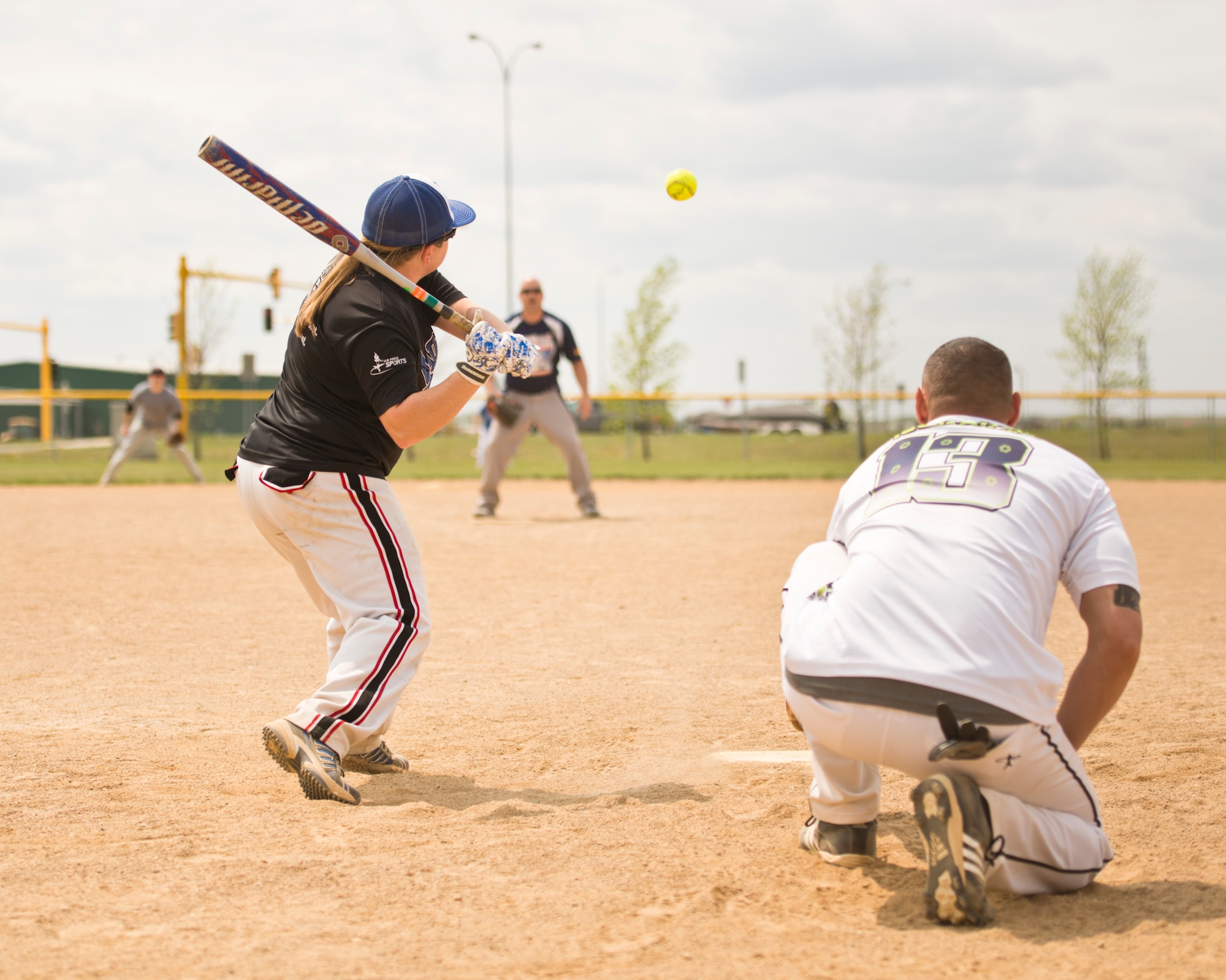 Team Minot faced-off against Team Grand Forks in the 2nd annual Wingman Week softball tournament in Devil’s Lake, N.D., May 20, 2016. Wingman week is intended to help Airmen recharge and to reframe the Wingman concept. Grand Forks won the final game, becoming this year’s softball tournament champions. (U.S. Air Force photo/Airman 1st Class J.T. Armstrong) 
