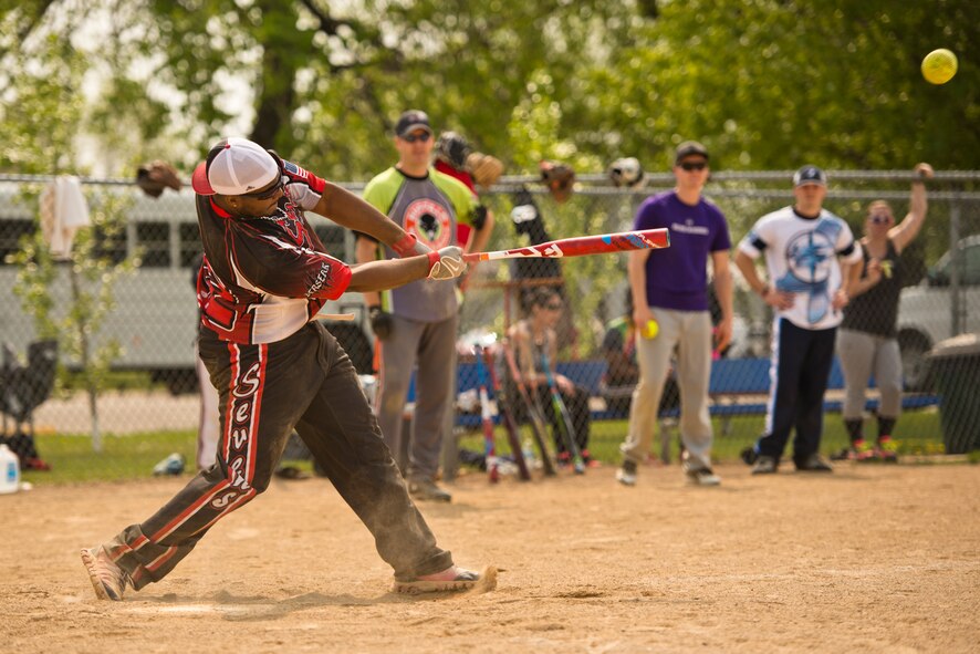 Team Minot faced-off against Team Grand Forks in the 2nd annual Wingman Week softball tournament in Devil’s Lake, N.D., May 20, 2016. Wingman week is intended to help Airmen recharge and to reframe the Wingman concept. Grand Forks won the final game, becoming this year’s softball tournament champions. (U.S. Air Force photo/Airman 1st Class J.T. Armstrong) 
