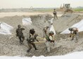 Airmen assigned to Pacific Air Forces bases excavate and refill a crater on the airfield at Gwangju Air Base, Republic of Korea, during an Airfield Damage Repair bilateral training scenario on June 1, 2016. The training is part of Pacific Unity, a bilateral training exercise designed to enhance interoperability and build partnership capacity in the Indo-Asia Pacific region. (U.S. Air Force photo/Staff Sgt. Chelsea Browning)
