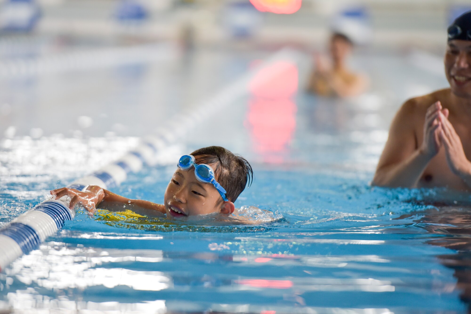 An Athlete in the 37th Annual Kanto Plains Special Olympics participates in a swimming race at Yokota Air Base, Japan, May 28, 2016. The theme for this year's event was “Perseverance & Never Fear.” (U.S. Air Force photo by Machiko Imai/Released)