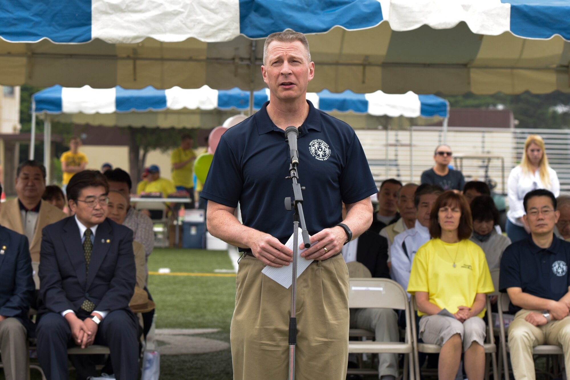 Lt. Gen. John L. Dolan, U.S. Forces, Japan, and 5th Air Force commander, gives the opening remarks for the 37th Annual Kanto Plains Special Olympics at Yokota Air Base, Japan, May 28, 2016. Dolan thanked the members of the organizing committee, corporate sponsors, all athletes and their families. (U.S. Air Force photo by Machiko Imai/Released)