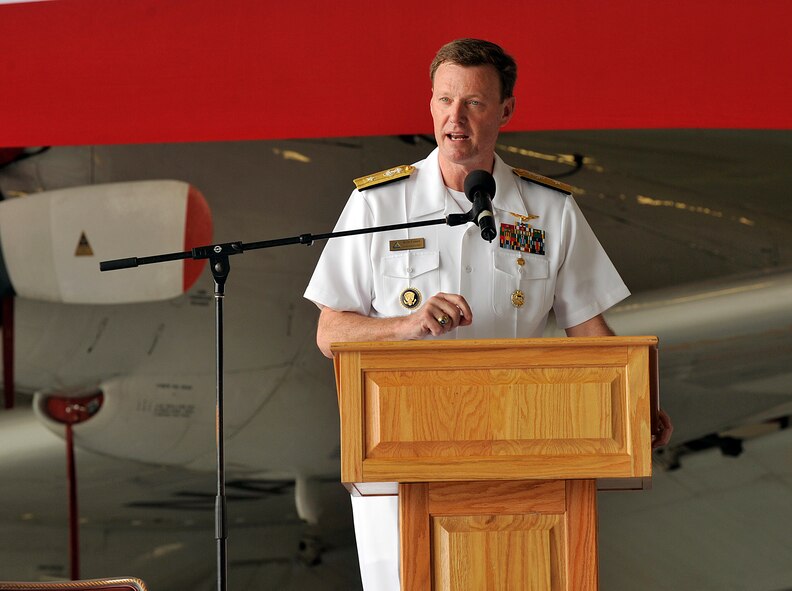U.S. Navy Rear Adm. Kyle Cozad, Patrol and Reconnaissance Group Pacific commander, speaks during the Patrol Squadron Forty change of command ceremony, June 2, 2016, at Kadena Air Base, Japan. During the ceremony, Cmdr. Aaron Shoemaker was relieved by Cmdr. Timothy Thompson as commander of Patrol Squadron Forty. (U.S. Air Force photo by Naoto Anazawa)
