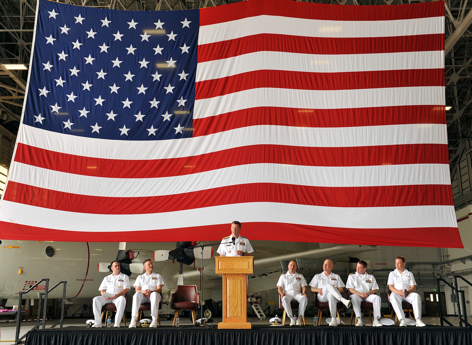 U.S. Navy Rear Adm. Kyle Cozad, Patrol and Reconnaissance Group Pacific commander, speaks during the Patrol Squadron Forty change of command ceremony, June 2, 2016, at Kadena Air Base, Japan. The change of command ceremony represents the changing of authority between outgoing and the incoming commanders. (U.S. Air Force photo by Naoto Anazawa)