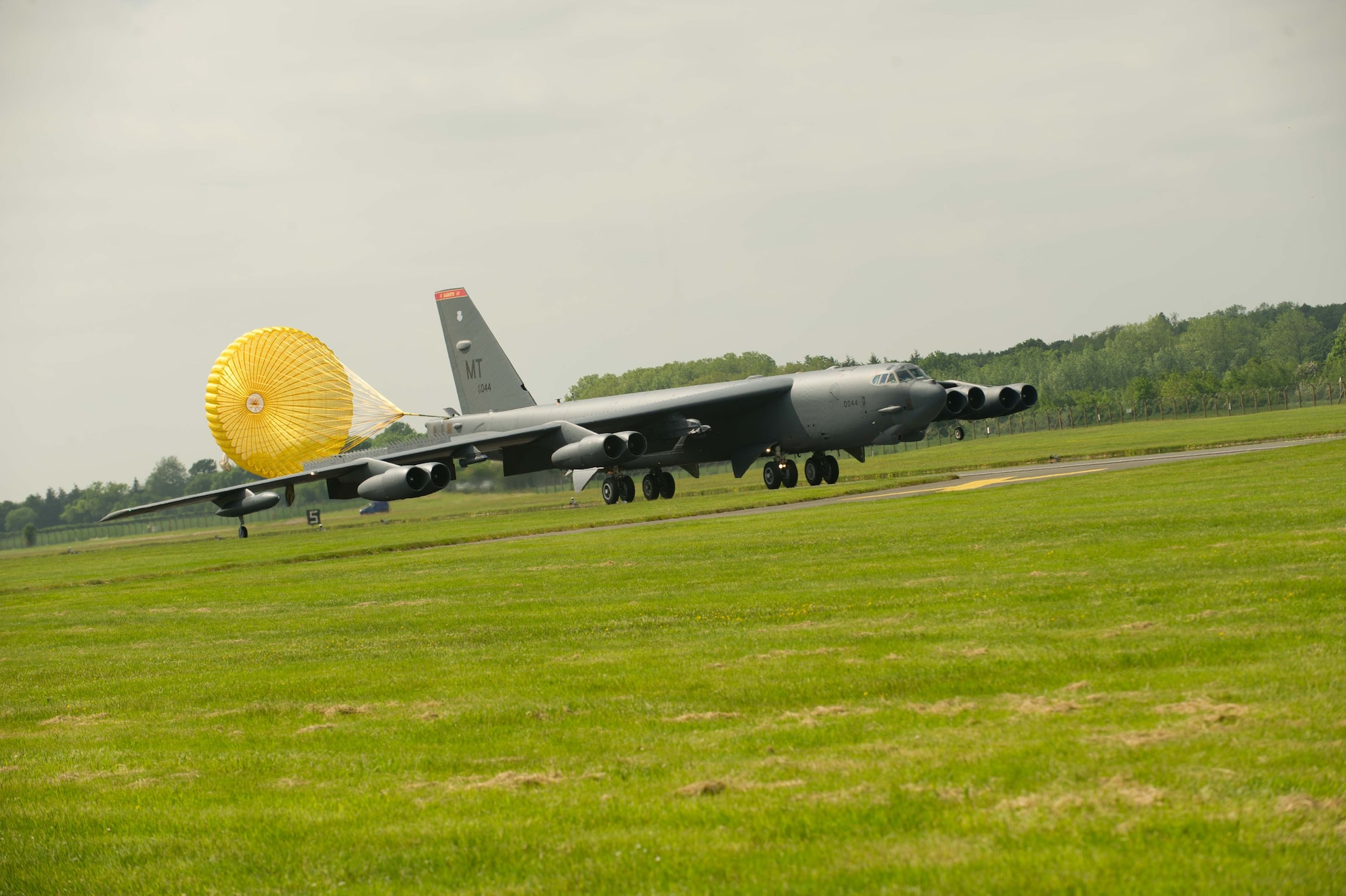 A B-52H Stratofortress from Minot Air Force Base, N.D., lands on the runway at Royal Air Force Fairford, United Kingdom, June 2, 2016. During the short term deployment, three strategic bombers are scheduled to conduct training flights with ground and naval forces around the region and participate in multinational exercises BALTOPS 16 and Saber Strike 16, and U.S. Africa Command’s Just Hammer. The bombers will integrate into several exercise activities, including air intercept training, mining operations, inert ordnance drops and close-air support. (U.S. Air Force photo/Senior Airman Sahara L. Fales)