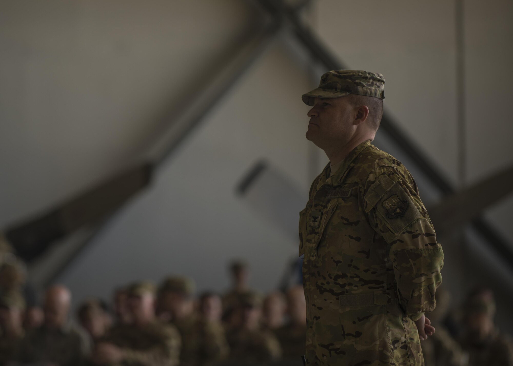 Col. Patrick Schlichenmeyer, 455th Air Expeditionary Wing vice commander, stands at parade rest during a change of command ceremony at Bagram Airfield, Afghanistan, June 03, 2016. The change of command ceremony is a military tradition that represents a formal transfer of authority and responsibility for a unit from one commanding officer to another. (U.S. Air Force photo by Senior Airman Justyn M. Freeman)
