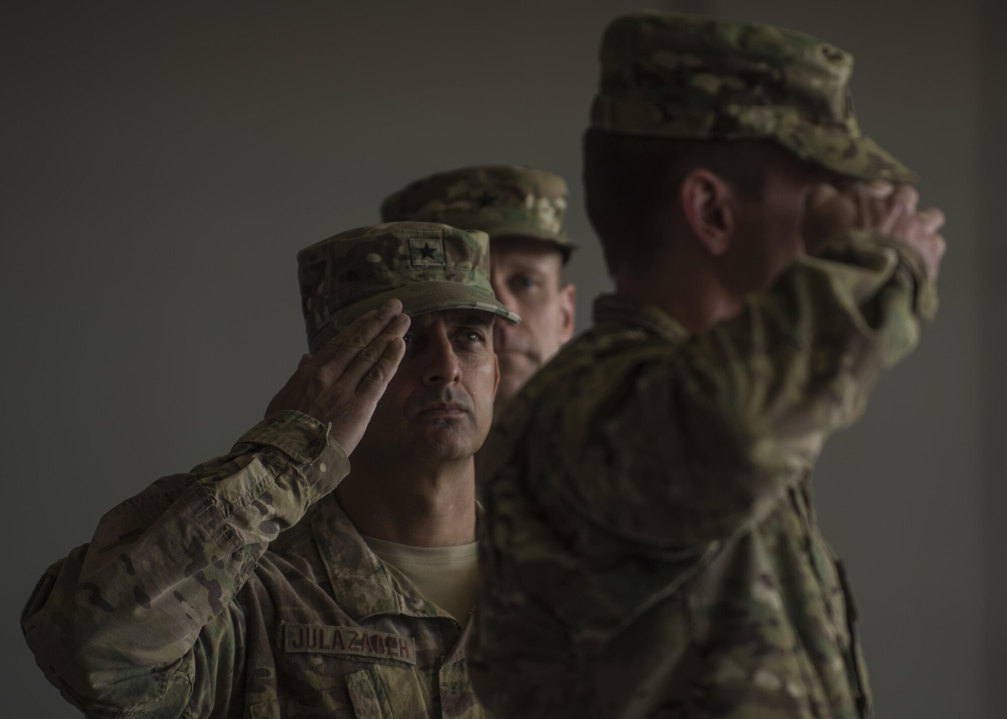 Brig. Gen. David Julazadeh, 455th Air Expeditionary Wing commander, salutes Maj. Gen. Geffrey Taliaferro, 9th Air and Space Expeditionary Task Force-Afghanistan commander, at a change of command ceremony at Bagram Airfield, Afghanistan, June 03, 2016. General Julazadeh relinquished command to Brig. General James Sears. (U.S. Air Force photo by Senior Airman Justyn M. Freeman)