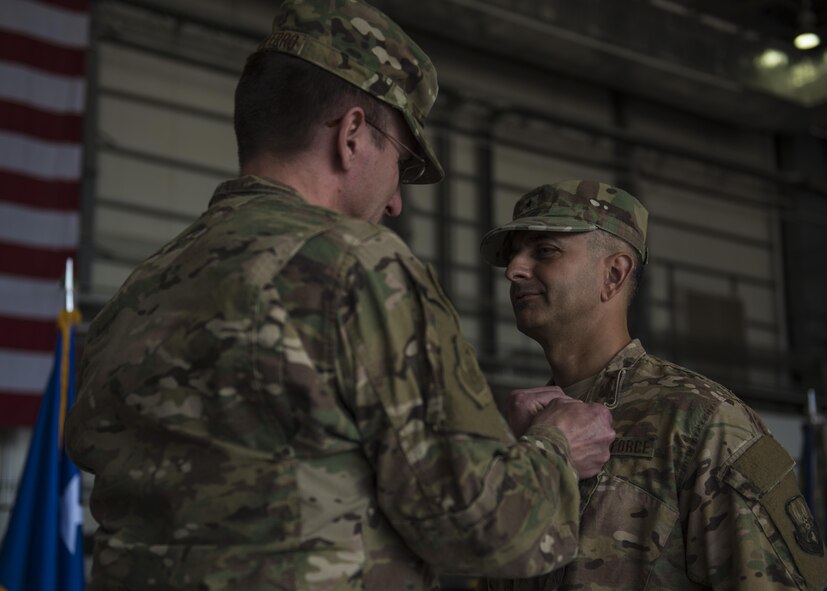 Maj. Gen. Geffrey Taliaferro, 9th Air and Space Expeditionary Task Force-Afghanistan commander, pins the Defense Superior Service Medal on Brig. Gen. David Julazadeh, 455th Air Expeditionary Wing commander, at Bagram Airfield, Afghanistan, June 03, 2016. Julazadeh has held the 455th AEW's command position for the past year and will now be headed to MacDill Air Force Base, Florida as deputy director, operations, J3, U.S. Central Command. (U.S. Air Force photo by Senior Airman Justyn M. Freeman)