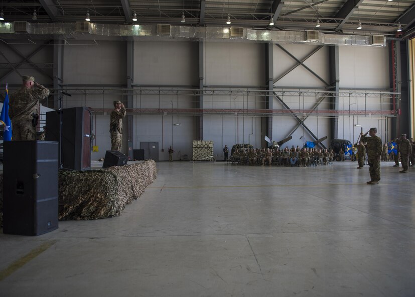 Brig. Gen. James Sears, 455th Air Expeditionary Wing commander, renders his first salute to the Airmen of 455th AEW during a change of command ceremony at Bagram Airfield, Afghanistan, June 03, 2016. Sears comes to the 455th AEW from the Headquarters Air Force Personnel Center, Joint Base San Antonio-Randolph, Texas where he serves as Director of Assignments and Air and Space Expeditionary Force Operations. (U.S. Air Force photo by Senior Airman Justyn M. Freeman)