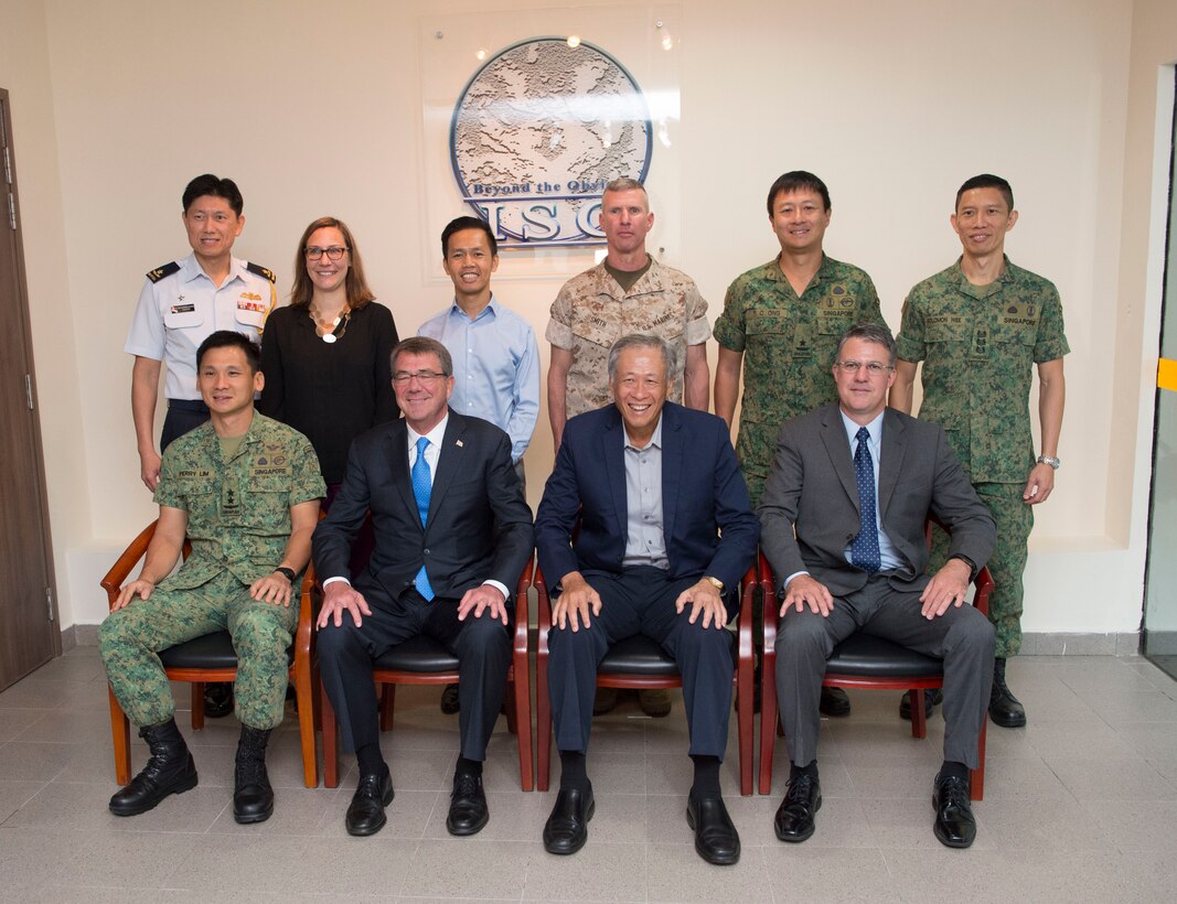 Defense Secretary Ash Carter poses for a photo with Singaporean Defense Minister Ng Eng Hen and defense officials from both countries in Singapore, June 3, 2016. DoD photo by Navy Petty Officer 1st Class Tim D. Godbee