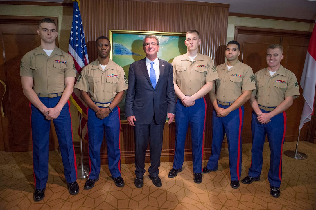 Defense Secretary Ash Carter poses for a photo with U.S. Marines assigned to the U.S. embassy in Singapore, June 3, 2016. DoD photo by Navy Petty Officer 1st Class Tim D. Godbee