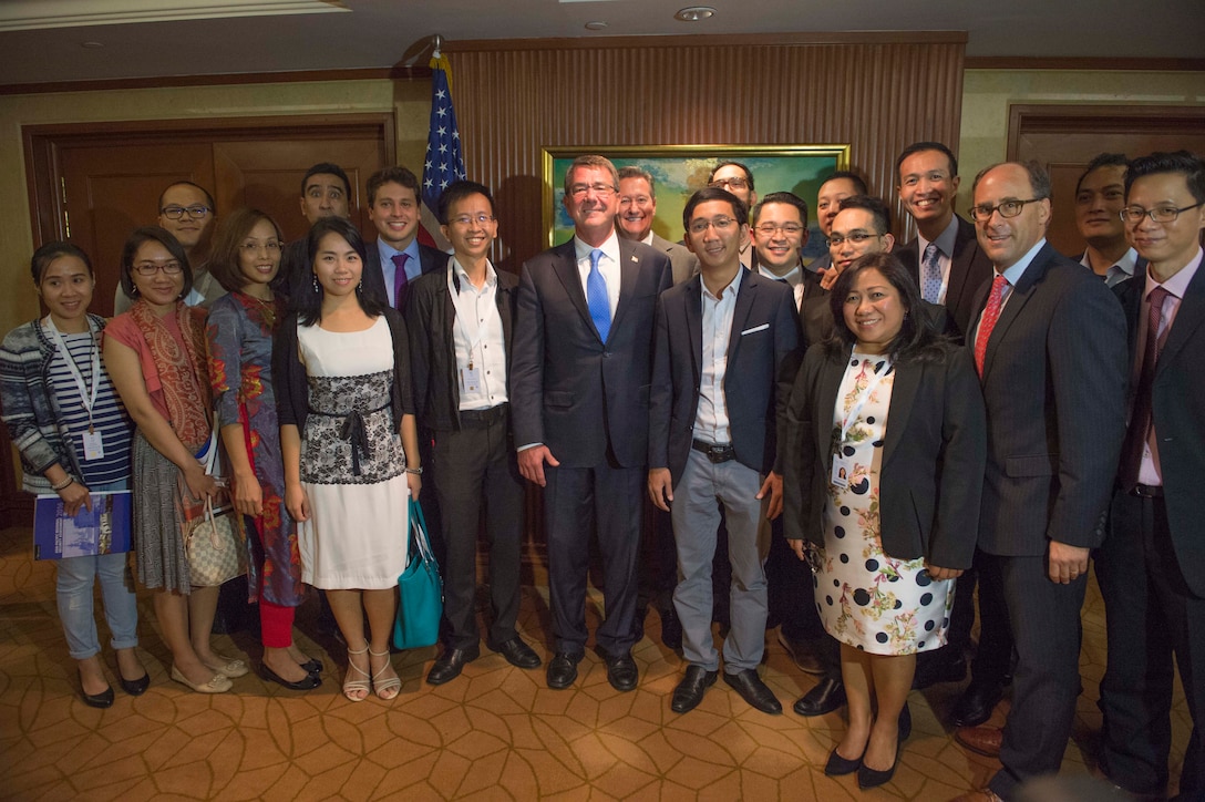 Defense Secretary Ash Carter, center, poses for a photo with the Young Asian Leaders group in Singapore, June 3, 2016. Carter is in Singapore attending the 15th International Institute for Strategic Studies Asia Security Summit. DoD photo by Navy Petty Officer 1st Class Tim D. Godbee
