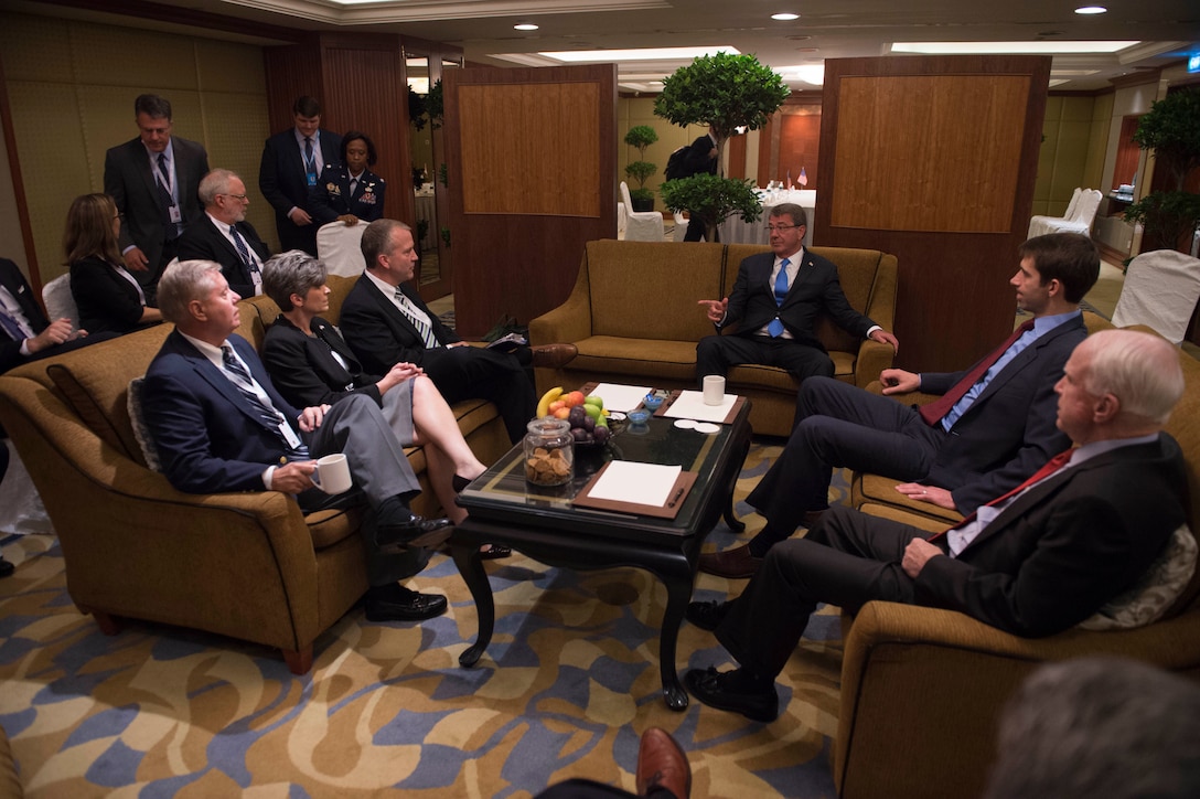 Defense Secretary Ash Carter, center, sits for a meeting with U.S. Sens. John McCain of Airzona, Tom Cotton of Arizona, Lindsey Graham of South Carolina, Joni Ernst of Iowa, Cory Gardner of Colorado, and Daniel Sullivan of Alaska, in Singapore, June 3, 2016. Carter is in Singapore attending the 15th International Institute for Strategic Studies Asia Security Summit. DoD photo by Navy Petty Officer 1st Class Tim D. Godbee