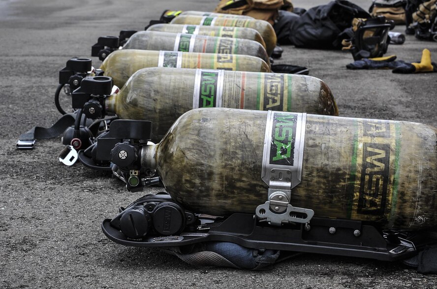 Oxygen tanks are prepared before a biannual-training exercise June 2, 2016, at Ramstein Air Base, Germany. 86th Civil Engineer Squadron Airmen conduct these trainings to keep up and expand their job knowledge and skillsets. (U.S. Air Force photo/Senior Airman Larissa Greatwood)