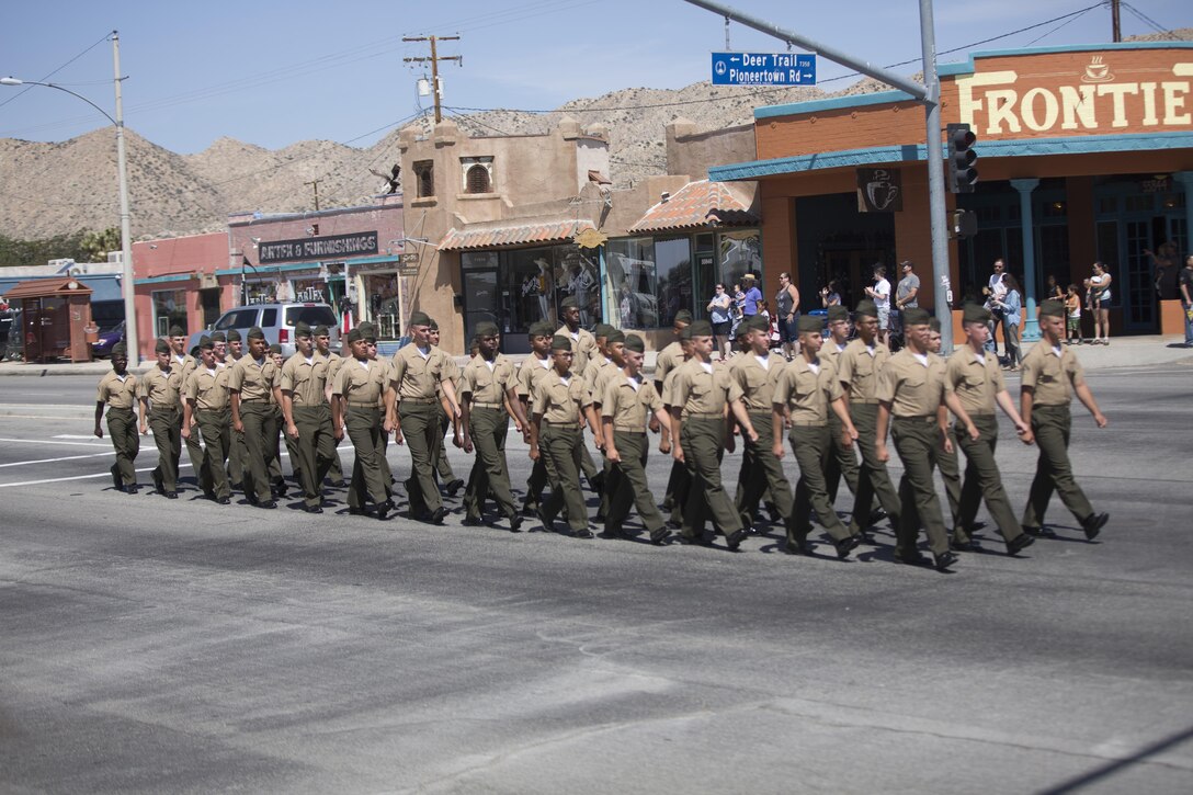 Marines with the Marine Corps Communication-Electronics School, march during the annual Grubstake Days Parade in Yucca Valley, Calif., May 28, 2016. The parade was held as part of Yucca Valley’s Annual Grubstake Days, a festival held to embrace the mining heritage of the Yucca Valley community. (Official Marine Corps photo by Cpl. Medina Ayala-Lo/Released)