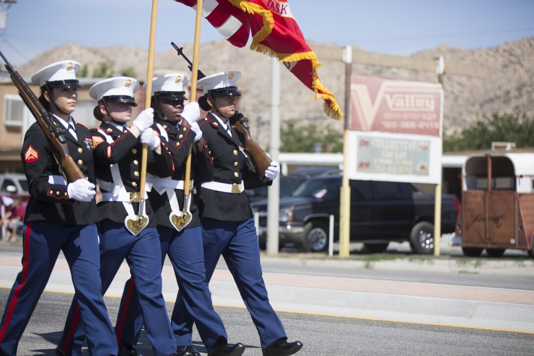 The Combat Center Color Guard marches during the annual Grubstake Days Parade in Yucca Valley, Calif., May 28, 2016. The parade was held as part of Yucca Valley’s Annual Grubstake Days, a festival held to embrace the mining heritage of the Yucca Valley community. (Official Marine Corps photo by Cpl. Medina Ayala-Lo/Released)