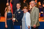 Chief Warrant Officer 2 Ryan Anderson of the California National Guard displays the MacArthur Leadership Award on June 1 at the Pentagon, moments after receiving the prestigious honor from Chief of Staff of the Army Gen. Mark A. Milley. Anderson is joined by his wife, Angela, father, Robert, and Susan Anderson. The award is presented annually to one National Guard warrant officer and 28 Army officers overall nationwide who exemplify the ideals for which Gen. Douglas MacArthur stood: duty, honor, country.