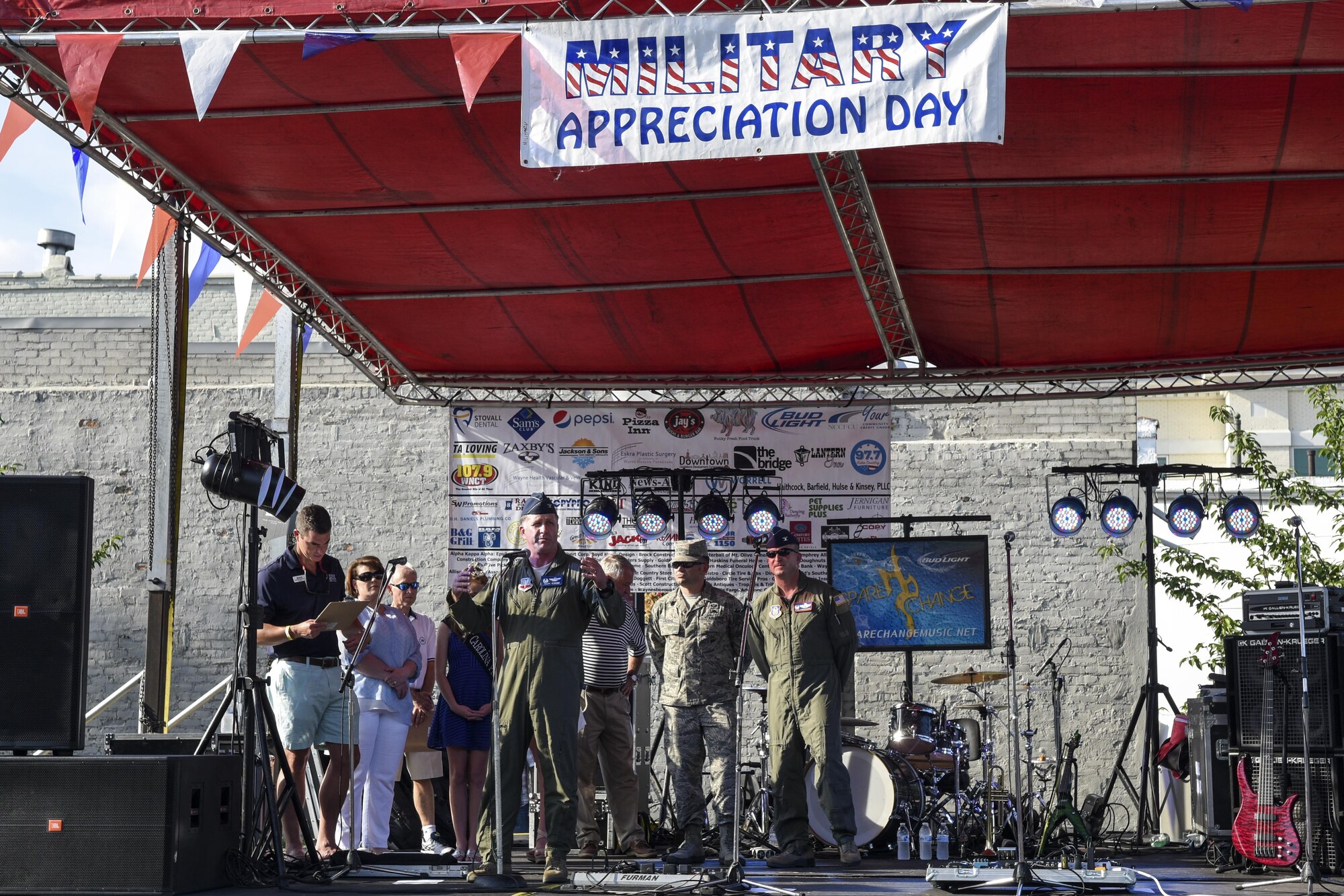 Col. Mark Slocum, 4th Fighter Wing commander, gives opening remarks during a Military Appreciation night held during Center Street Jam, June 2, 2016, in Goldsboro, North Carolina. More than 500 members of the base and local community attended the event which featured a live band, kid activities, and food trucks. (U.S. Air Force photo by Airman Shawna L. Keyes/Released) 