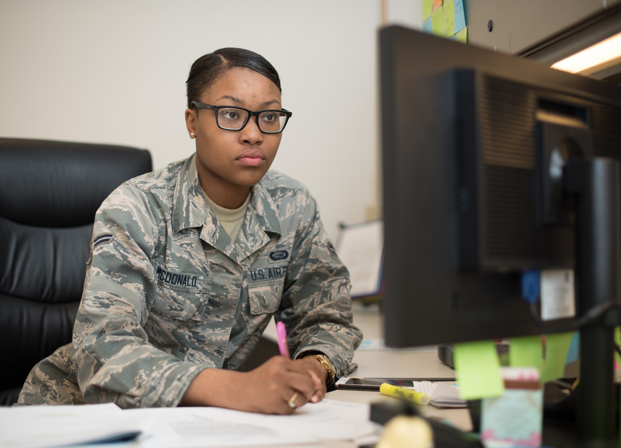 Airman 1st Class Amber McDonald, 349th Force Support Squadron personnelist, prepares official orders during an active duty tour at Travis Air Force Base, Calif., May 24, 2016.
McDonald, a traditional reservist, will contribute around 300 days of duty with her unit this year. (U.S. Air Force photo by Ken Wright)