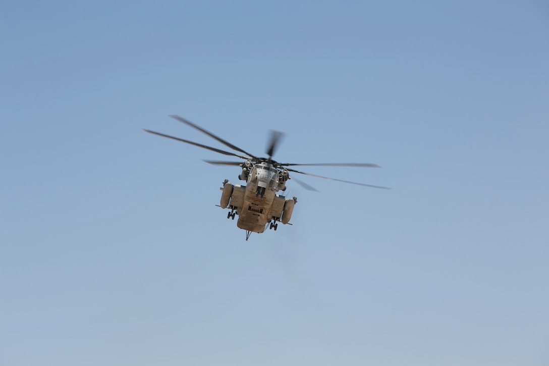 A CH-53 ‘Super Stallion’ flies near the Combat Ville training area aboard Marine Corps Air Station Yuma, Ariz., during Integrated Training Exercise 3-16, May 29, 2016. (Official Marine Corps photo by Cpl. Thomas Mudd/Released)