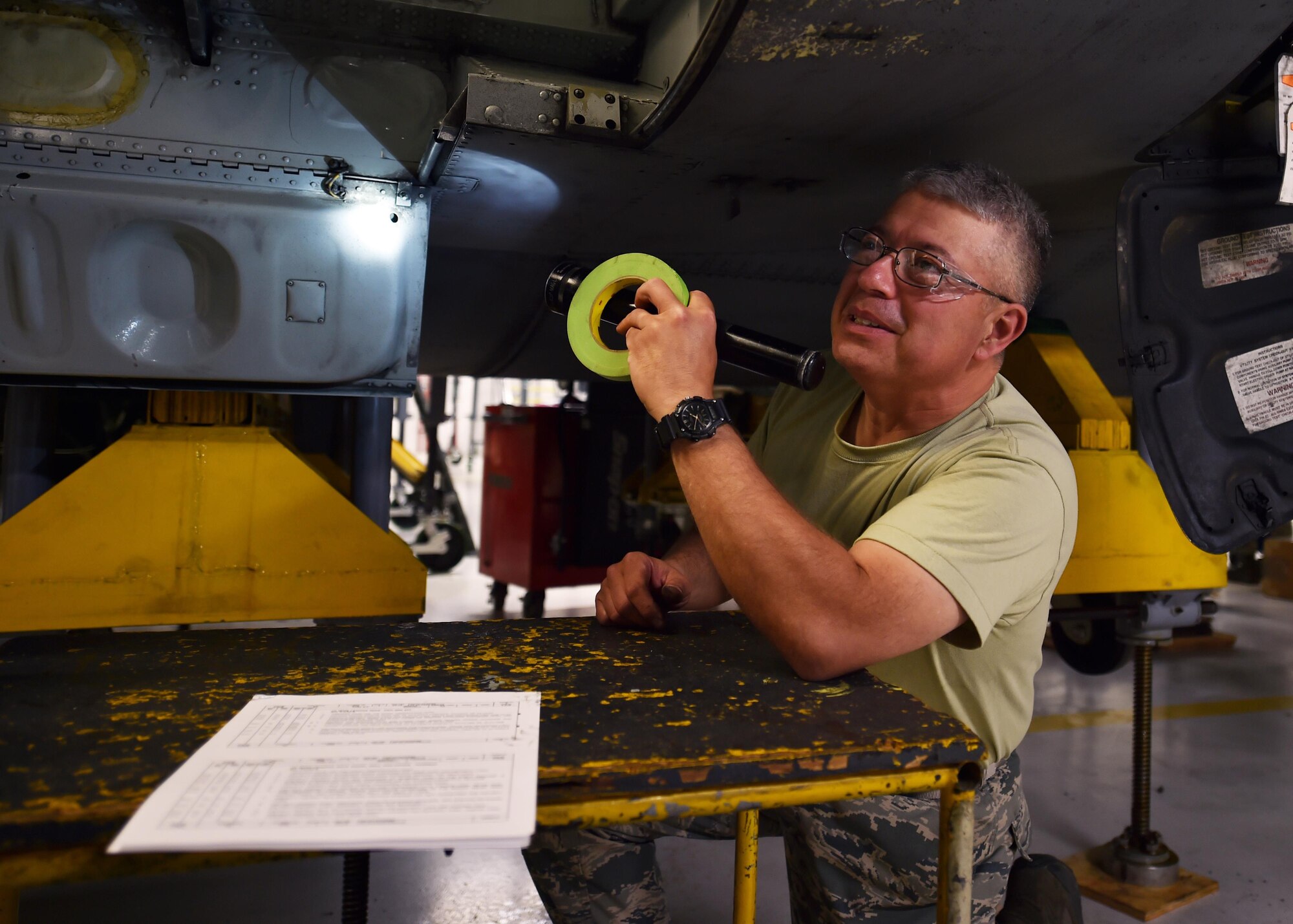 Tech. Sgt. Charles Wood, 910th Maintenance Squadron aircraft maintenance craftsman, conducts a phase one inspection on a C-130H Hercules aircraft here, May 14, 2016. His work was a part of a minor isochronal inspection, part of the scheduled preventative maintenance designed to keep the plane airworthy. (U.S. Air Force photo/Staff Sgt. Rachel Kocin)