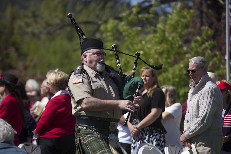 Retired U.S. Airforce Maj. Nelson Reynolds, plays “Amazing Grace” on the bag pipes during the Memorial Day Ceremony in Veteran’s Park at Big Bear Lake, Calif., May 30, 2016. Sgt. Maj. Michael J. Hendges, Combat Center Sergeant Major, represented the Combat Center as the guest speaker in the Memorial Day Ceremony spoke about the importance of remembering the ultimate sacrifice many American service members have paid. (Official Marine Corps photo by Cpl. Medina Ayala-Lo/Released)