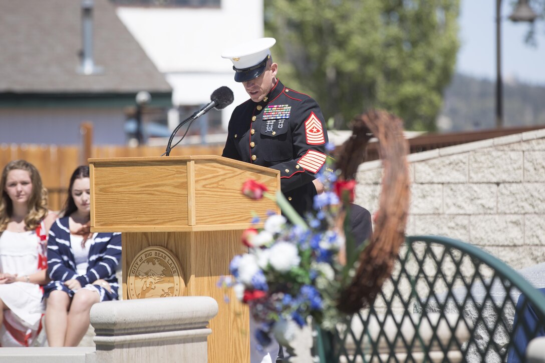 Sgt. Maj. Michael J. Hendges, Combat Center Sergeant Major, addresses ceremony attendees during the Memorial Day Ceremony in Veteran’s Park at Big Bear Lake, Calif., May 30, 2016. Hendges represented the Combat Center as the guest speaker in the Memorial Day Ceremony spoke about the importance of remembering the ultimate sacrifice many American service members have paid. (Official Marine Corps photo by Cpl. Medina Ayala-Lo/Released)