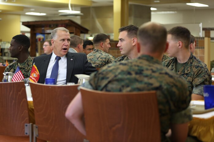 Sen. Thom Tillis, left, shares a meal with Marines at the mess hall during a visit at Marine Corps Air Station Cherry Point, N.C., June 1, 2016. Tillis visited the air station to address the needs and priorities of the base, and assess the Marine Corps’ presence in North Carolina. Tillis also toured Fleet Readiness Center East. Tillis is a North Carolina senator. (U.S. Marine Corps photo by Lance Cpl. Mackenzie Gibson/Released)