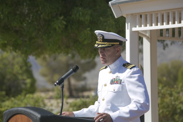 Navy Capt. Stephen Lee, assistant chief of staff, Religious Ministries, gives the invocation during the Memorial Day Ceremony at the 29 Palms Cemetery in Twentynine Palms, Calif., May 30, 2016. Maj. Gen. Lewis A. Craparotta, Combat Center Commanding General, represented the Combat Center as the guest speaker for the ceremony and spoke about the importance of remembering the ultimate sacrifice many American service members have paid. (Official Marine Corps photo by Cpl. Thomas Mudd/Released)