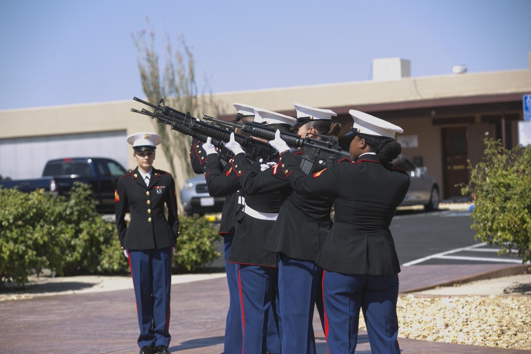 Combat Center Marines give a rifle salute during the Memorial Day Ceremony at the 29 Palms Cemetery in Twentynine Palms, Calif., May 30, 2016. Maj. Gen. Lewis A. Craparotta, Combat Center Commanding General, represented the Combat Center as the guest speaker for the ceremony and spoke about the importance of remembering the ultimate sacrifice many American service members have paid. (Official Marine Corps photo by Cpl. Thomas Mudd/Released)