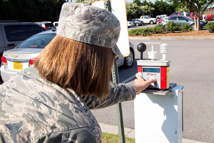 U.S. Air Force Staff Sgt. Bryana Hodge, 23d Aerospace Medicine Squadron bioenvironmental engineering journeyman, checks the weather conditions on an environmental thermal monitor, June 2, 2016, at Moody Air Force Base, Ga. The monitor is a part of the base’s heat index tracking efforts, which calculates the weather condition’s temperature, solar radiation, relative humidity and wind speed, through four flag conditions. The color coded flag conditions detail gradual heat stages that determine proper work-rest cycles and water consumption to avoid getting heat illnesses. (U.S. Air Force photo by Airman 1st Class Greg Nash/Released) 